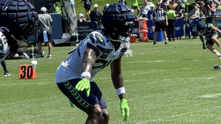 Seattle Seahawks safety K'Von Wallace communicates with cornerback Lance Boykin during a drill at training camp.