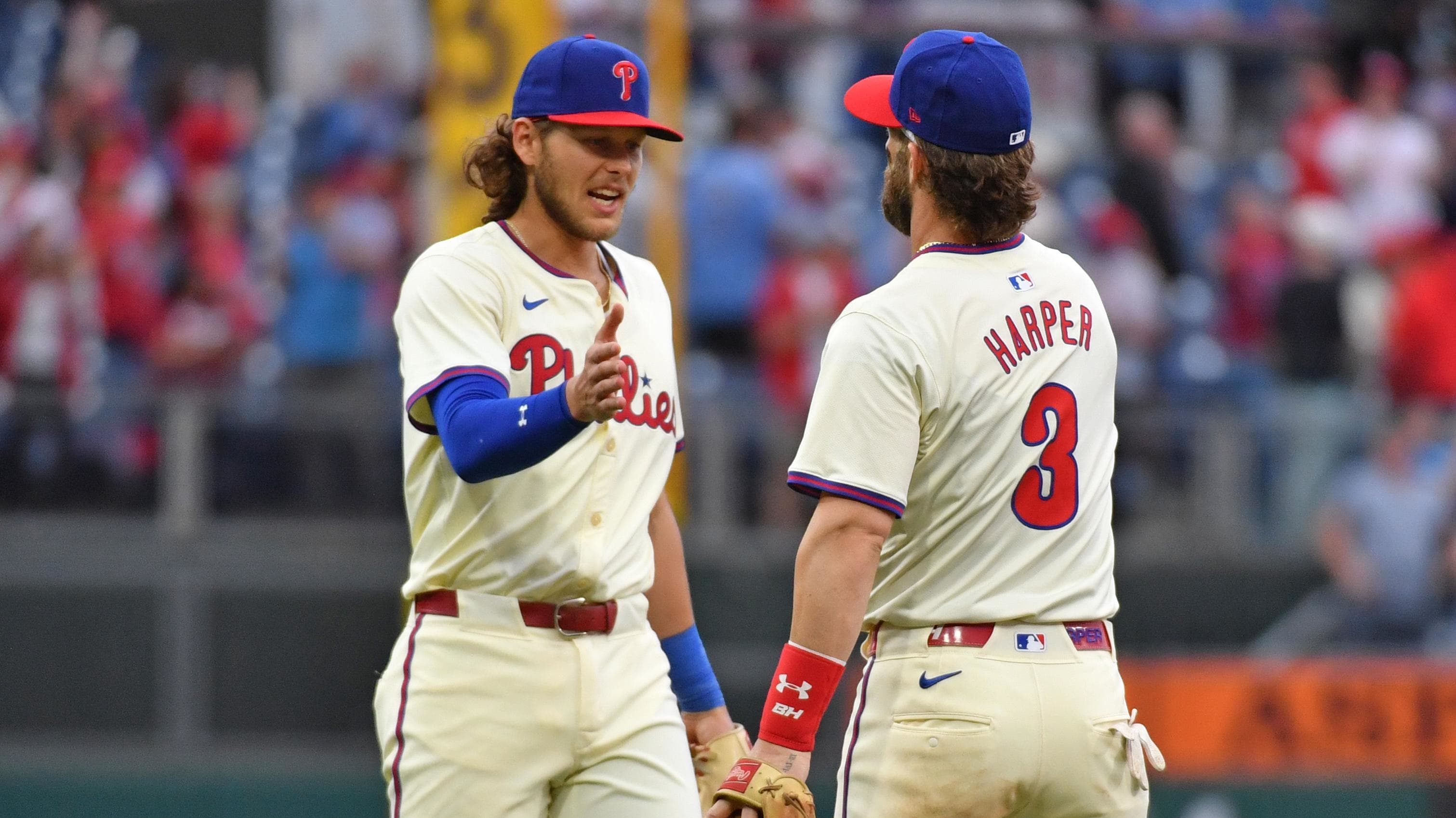 May 6, 2024; Philadelphia, PA, USA;  Philadelphia Phillies infielders Alec Bohm (28) and Bryce Harper (3) celebrate a win.