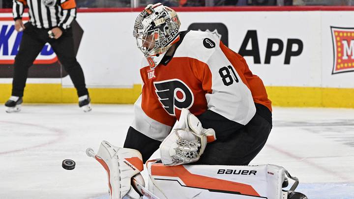 May 7, 2026; Philadelphia, Pennsylvania, USA; Philadelphia Flyers goaltender Dan Vladar (80) makes a save against the Carolina Hurricanes during the second period in game three of the second round of the 2026 Stanley Cup Playoffs at Xfinity Mobile Arena.