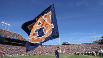 Nov 5, 2016; Auburn, AL, USA;   An Auburn Tigers cheerleader carries a flag through the endzone after the Tigers scored a touchdown against the Vanderbilt Commodores during the third quarter at Jordan Hare Stadium.  The Tigers beat the Commodores 23-16. Mandatory Credit: John Reed-USA TODAY Sports