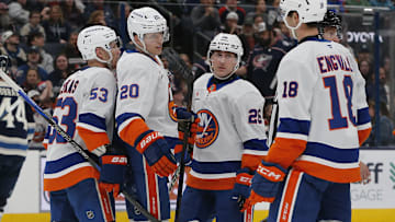 Apr 17, 2025; Columbus, Ohio, USA; New York Islanders right wing Hudson Fasching (20) celebrates his goal against the Columbus Blue Jackets during the third period at Nationwide Arena. Mandatory Credit: Russell LaBounty-Imagn Images