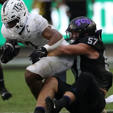 TCU Linebacker Johnny Hodges making a tackle