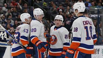 Apr 17, 2025; Columbus, Ohio, USA; New York Islanders right wing Hudson Fasching (20) celebrates his goal against the Columbus Blue Jackets during the third period at Nationwide Arena. Mandatory Credit: Russell LaBounty-Imagn Images