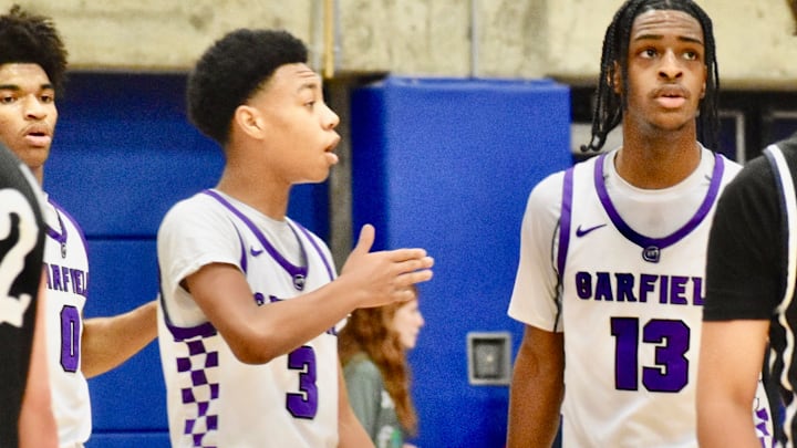 Garfield guard B.J. Roy, son of and coach and ex-NBA star Brandon Roy, landed a spot on the Washington Huskies roster. Garfield guard B.J. Roy, son of and coach and ex-NBA star Brandon Roy, landed a spot on the Washington Huskies roster.