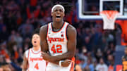 Dec 2, 2025; Syracuse, New York, USA; Syracuse Orange forward William Kyle III (42) celebrates against the Tennessee Volunteers during the second half at the JMA Wireless Dome. Mandatory Credit: Rich Barnes-Imagn Images