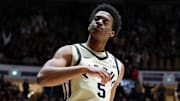 Purdue Boilermakers guard Myles Colvin (5) reacts after dunking the ball