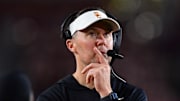 Nov 7, 2025; Los Angeles, California, USA; Southern California Trojans head coach Lincoln Riley watches game action against the Northwestern Wildcats during the second half at the Los Angeles Memorial Coliseum. Mandatory Credit: Gary A. Vasquez-Imagn Images