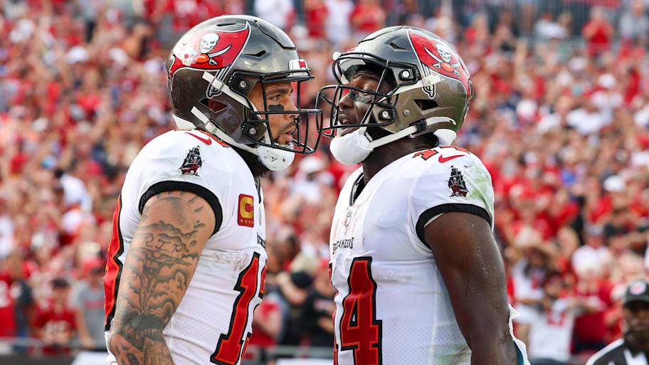 Tampa Bay Buccaneers wide receiver Chris Godwin congratulates wide receiver Mike Evans after scoring a touchdown. | Nathan Ray Seebeck-Imagn Images