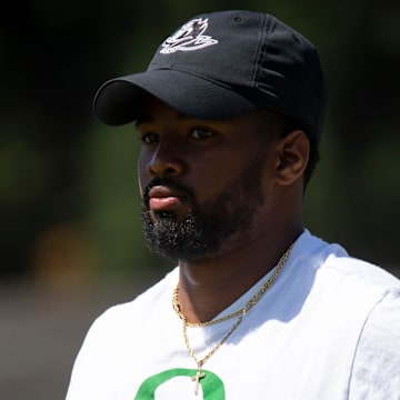 Oregon running backs coach Ra'Shaad Samples works with the team during the Ducks’ fall camp Tuesday, Aug. 6, 2024, at the Hatfield-Dowlin Complex in Eugene, Ore.