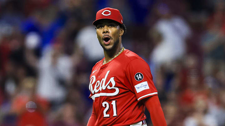 Cincinnati Reds starting pitcher Hunter Greene (21) reacts