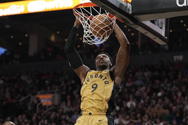 Toronto Raptors guard RJ Barrett (9) dunks the ball against the Golden State Warriors in 2023-24.