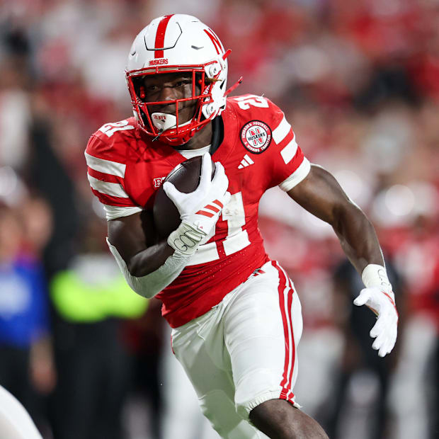 Nebraska running back Emmett Johnson scores his third touchdown against Akron on a six-yard run.