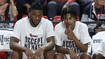 Nov 4, 2024; Queens, New York, USA;  St. John's basketball forward Zuby Ejiofor (24) and guard Simeon Wilcher (7) sit on the bench prior to the starting lineup introductions against the Fordham Rams at Carnesecca Arena