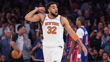 Apr 19, 2025; New York, New York, USA; New York Knicks center Karl-Anthony Towns (32) reacts after scoring against the Detroit Pistons in Game One of the First Round of the NBA Playoffs at Madison Square Garden. Mandatory Credit: Wendell Cruz-Imagn Images