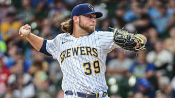 Aug 7, 2022; Milwaukee, Wisconsin, USA;  Milwaukee Brewers pitcher Corbin Burnes (39) throws a pitch in the first inning against the Cincinnati Reds at American Family Field. Mandatory Credit: Benny Sieu-Imagn Images