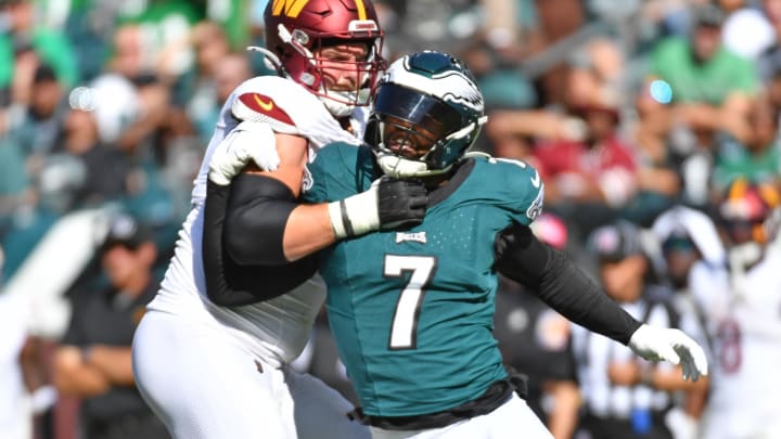 Oct 1, 2023; Philadelphia, Pennsylvania, USA; Philadelphia Eagles linebacker Haason Reddick (7) is blocked by Washington Commanders guard Andrew Wylie (71) at Lincoln Financial Field. Mandatory Credit: Eric Hartline-USA TODAY Sports