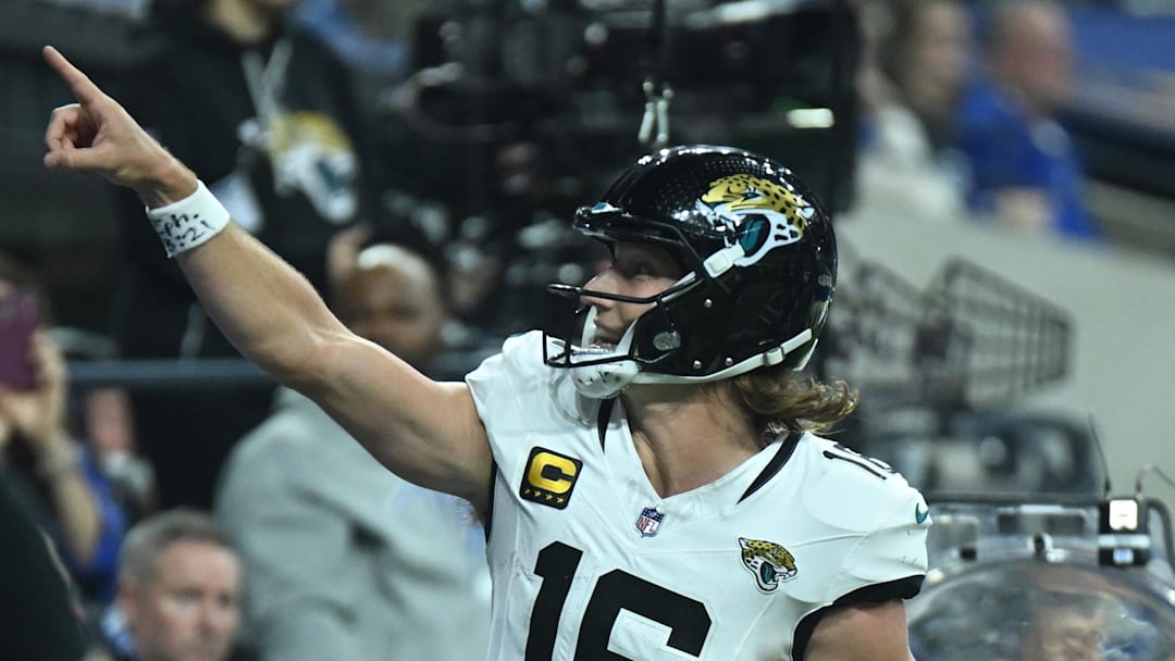 Dec 28, 2025; Indianapolis, Indiana, USA; Jacksonville Jaguars quarterback Trevor Lawrence (16) reacts after a touchdown during the second half against the Indianapolis Colts at Lucas Oil Stadium. Mandatory Credit: Robert Goddin-Imagn Images