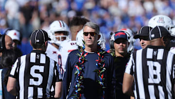 Oct 12, 2024; Provo, Utah, USA; Arizona Wildcats head coach Brent Brennan speaks with officials during the second quarter of the game against the Brigham Young Cougars at LaVell Edwards Stadium. Mandatory Credit: Rob Gray-Imagn Images