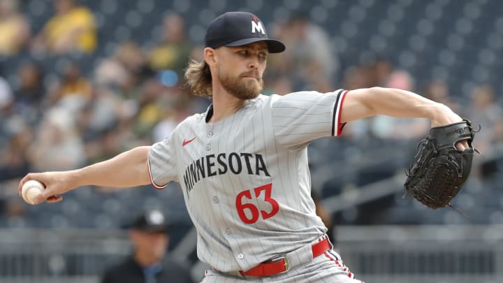 Jun 9, 2024; Pittsburgh, Pennsylvania, USA; Minnesota Twins relief pitcher Josh Staumont (63) pitches against the Pittsburgh Pirates during the tenth inning at PNC Park. The Twins won 11-5 in ten innings.