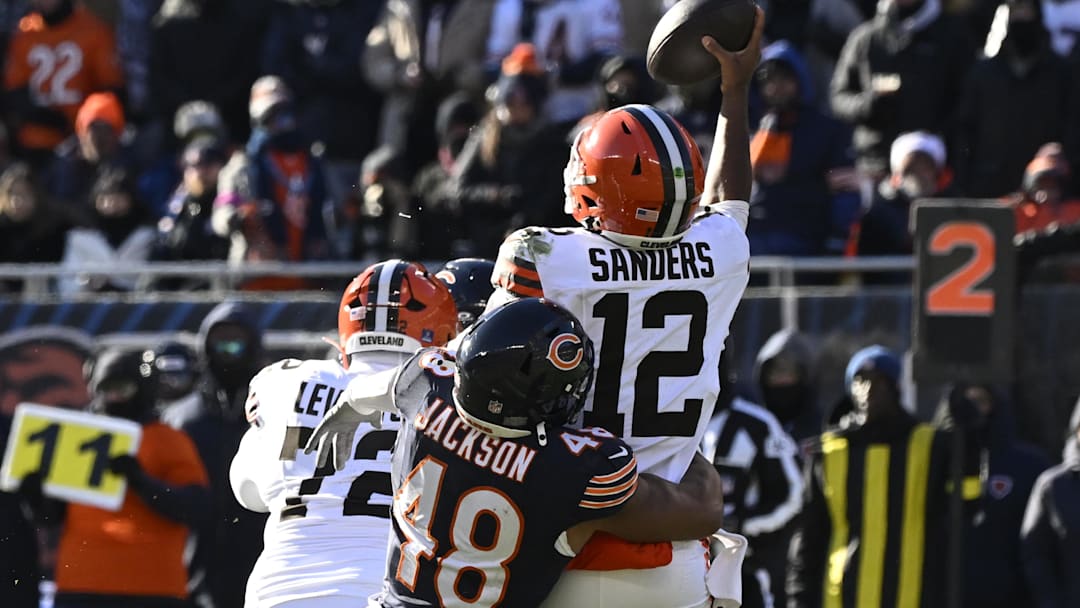 Dec 14, 2025; Chicago, Illinois, USA; Chicago Bears linebacker D'Marco Jackson (48) sacks Cleveland Browns quarterback Shedeur Sanders (12) during the second quarter at Soldier Field. Mandatory Credit: Matt Marton-Imagn Images
