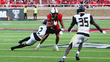 Aug 30, 2025; Lubbock, Texas, USA;  Texas Tech Red Raiders wide receiver Reggie Virgil (1) rushes against Arkansas-Pine Bluff Golden Lions defensive back Kristian Gammage (2) in the first half at Jones AT&T Stadium. Mandatory Credit: Michael C. Johnson-Imagn Images