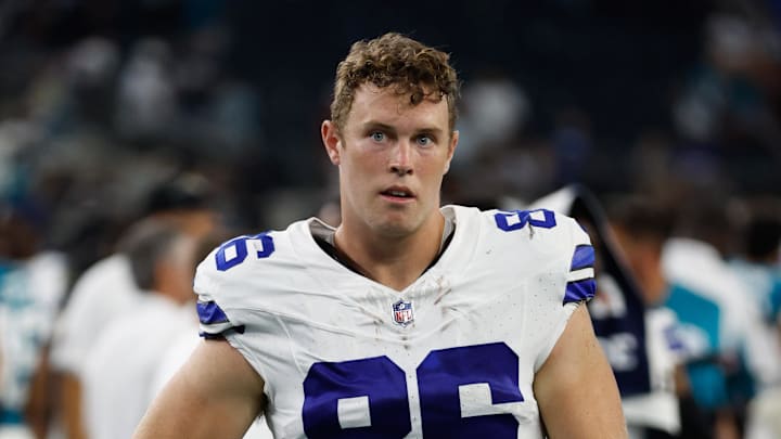 Dallas Cowboys tight end Luke Schoonmaker walks off the field after the game against the Jacksonville Jaguars. Dallas Cowboys tight end Luke Schoonmaker walks off the field after the game against the Jacksonville Jaguars.