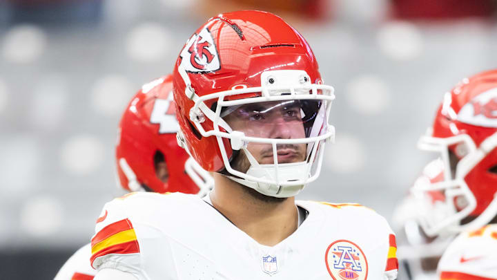 Aug 9, 2025; Glendale, Arizona, USA; Kansas City Chiefs tight end Jared Wiley (12) against the Arizona Cardinals during a preseason NFL game at State Farm Stadium. Mandatory Credit: Mark J. Rebilas-Imagn Images