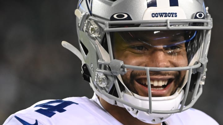 Philadelphia, Pennsylvania, USA; Dallas Cowboys quarterback Dak Prescott (4) smiles. On the field against the Philadelphia Eagles during the second quarter at Lincoln Financial Field. 