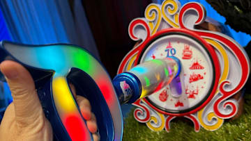 The new Key to Disneyland unlocks interactive effects in each of Disneyland's nine lands, during its 70th anniversary celebration. Once guests visit them all, the back of the key reveals a mystery pin.