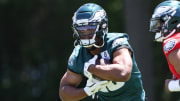 May 30, 2024; Philadelphia, PA, USA; Philadelphia Eagles running back Saquon Barkley (26) runs with the ball during practice at NovaCare Complex. Mandatory Credit: Bill Streicher-USA TODAY Sports