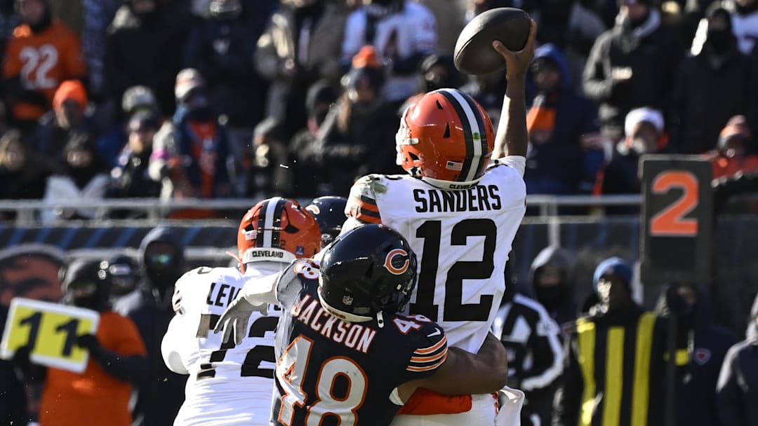 Chicago Bears linebacker D'Marco Jackson (48) sacks Cleveland Browns quarterback Shedeur Sanders (12) Chicago Bears linebacker D'Marco Jackson (48) sacks Cleveland Browns quarterback Shedeur Sanders (12)