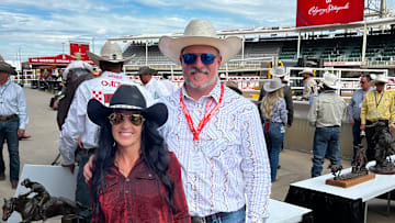 Anita Ellis accepting her $50,000 bonus check for winning Calgary.