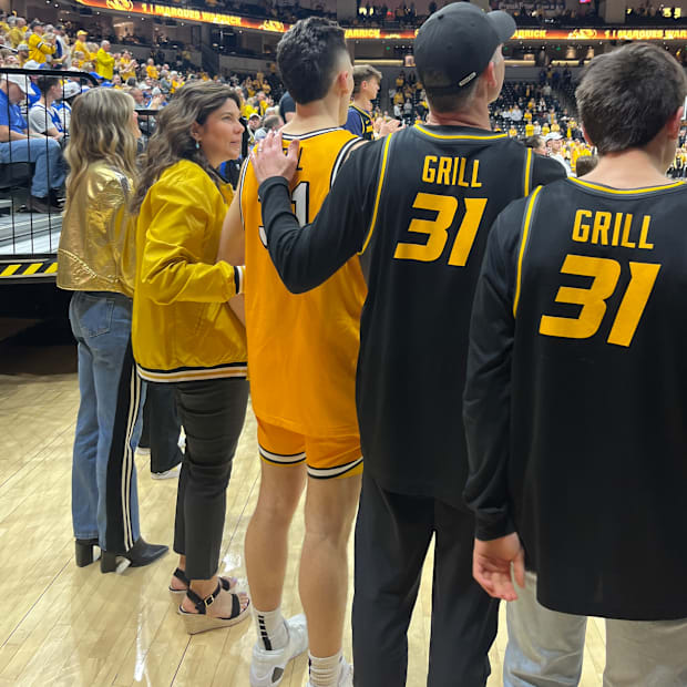 Missouri Tigers guard Caleb Grill (31) with his family in the tunnel of Mizzou Arena before walking out for Senior Day celebr