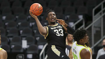 Dec 12, 2020; Atlanta, Georgia, USA; Wofford Terriers forward B.J. Mack (33) shoots against the