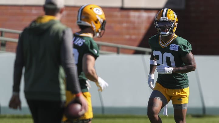 Green Bay Packers defensive back Javon Bullard (20) runs through drills during rookie minicamp on May 3.