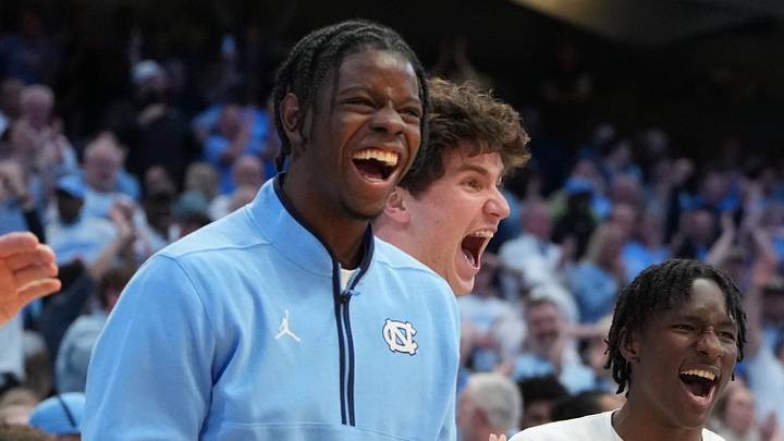 Feb 23, 2026; Chapel Hill, North Carolina, USA; North Carolina Tar Heels forward Caleb Wilson (8) and the bench react in the second half at Dean E. Smith Center. Mandatory Credit: Bob Donnan-Imagn Images