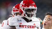 Dec 26, 2024; Phoenix, AZ, USA; Rutgers Scarlet Knights linebacker Mohamed Toure (1) against the Kansas State Wildcats during the Rate Bowl at Chase Field. Mandatory Credit: Mark J. Rebilas-Imagn Images
