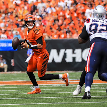 Sep 8, 2024; Cincinnati, Ohio, USA; Cincinnati Bengals quarterback Joe Burrow (9) runs with the ball against the New England Patriots in the first half at Paycor Stadium. Mandatory Credit: Katie Stratman-Imagn Images