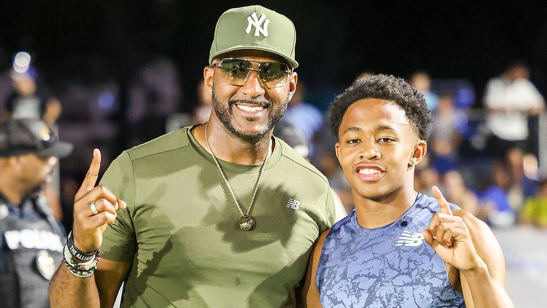 Joe Lee (left), with his former Bullis School star Quincy Wilsonat the 2025 Ed Murphey Classic at University of Memphis. has left Bullis after 13 years to become the new head track and field coach at Our Lady of Good Council.