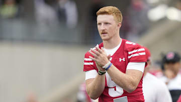 Sep 6, 2025; Madison, Wisconsin, USA; Wisconsin Badgers quarterback Billy Edwards Jr. (9) reacts to a play against the Middle Tennessee Blue Raiders during the second half at Camp Randall Stadium. Mandatory Credit: Kayla Wolf-Imagn Images