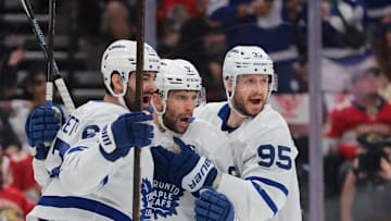 May 9, 2025; Sunrise, Florida, USA; Toronto Maple Leafs center John Tavares (91) celebrates with left wing Max Pacioretty (67) and defenseman Oliver Ekman-Larsson (95) after scoring against the Florida Panthers during the first period in game three of the second round of the 2025 Stanley Cup Playoffs at Amerant Bank Arena. Mandatory Credit: Sam Navarro-Imagn Images