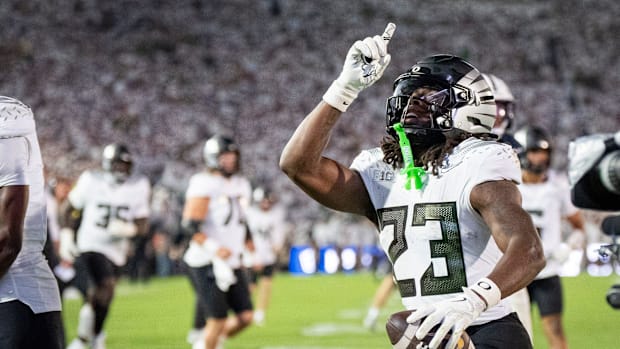 Oregon running back Dierre Hill Jr. celebrates a touchdown as the Oregon Ducks face the Penn State Nittany Lions on Sept. 27,