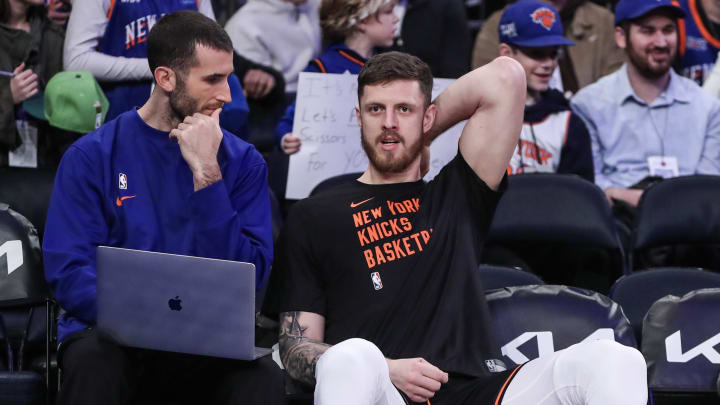 Jan 9, 2024; New York, New York, USA; New York Knicks center Isaiah Hartenstein (right) talks with Assistant Director of Player Development Scott King prior to the game against the Portland Trail Blazers at Madison Square Garden. Mandatory Credit: Wendell Cruz-USA TODAY Sports