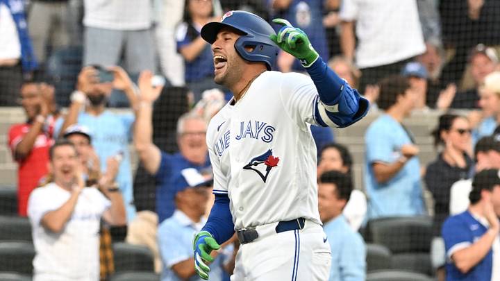 Jun 29, 2026; Toronto, Ontario, CAN;  Toronto Blue Jays designated hitter George Springer (4) reacts after scoring a run on a triple and an error against the New York Mets in the first inning at Rogers Centre. Mandatory Credit: Dan Hamilton-Imagn Images