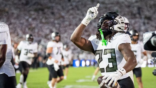 Oregon running back Dierre Hill Jr. celebrates a touchdown as the Oregon Ducks face the Penn State Nittany Lions on Sept. 27,