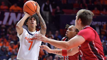 Nov 8, 2024; Champaign, Illinois, USA;  Illinois Fighting Illini forward Will Riley (7) shoots the ball over SIU Edwardsville Cougars forward Jo Valrie (33) during the first half at State Farm Center. Mandatory Credit: Ron Johnson-Imagn Images