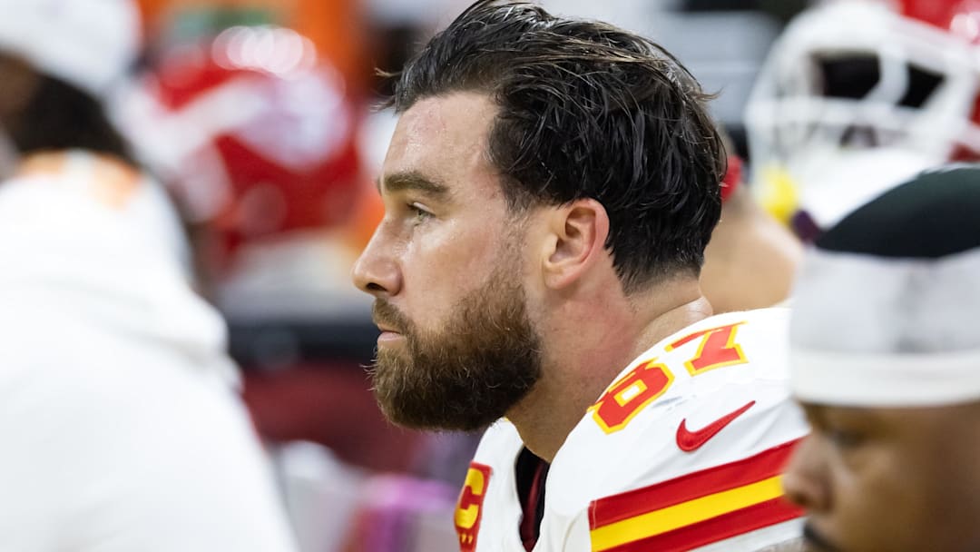 Feb 9, 2025; New Orleans, LA, USA;  Kansas City Chiefs tight end Travis Kelce (87) reacts on the bench in the fourth quarter against the Philadelphia Eagles in Super Bowl LIX at Ceasars Superdome. Mandatory Credit: Mark J. Rebilas-Imagn Images