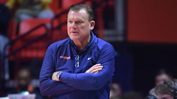 Dec 29, 2023; Champaign, Illinois, USA; Illinois Fighting Illini head coach Brad Underwood watches