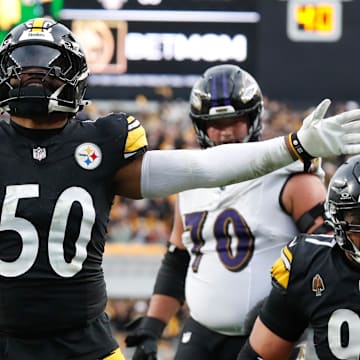 Nov 17, 2024; Pittsburgh, Pennsylvania, USA;  Pittsburgh Steelers linebacker Elandon Roberts (50) reacts after stopping the Baltimore Ravens on a two point conversion attempt during the fourth quarter at Acrisure Stadium. Mandatory Credit: Charles LeClaire-Imagn Images