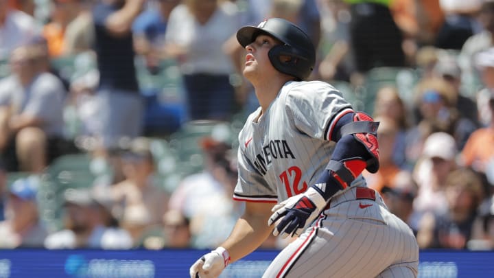 Minnesota Twins third baseman Brooks Lee (72) hits a sacrifice fly to score a run in the second inning against the Detroit Tigers at Comerica Park in Detroit on July 28, 2024. 